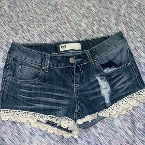 Cute jean shorts with flower printing at the bottom